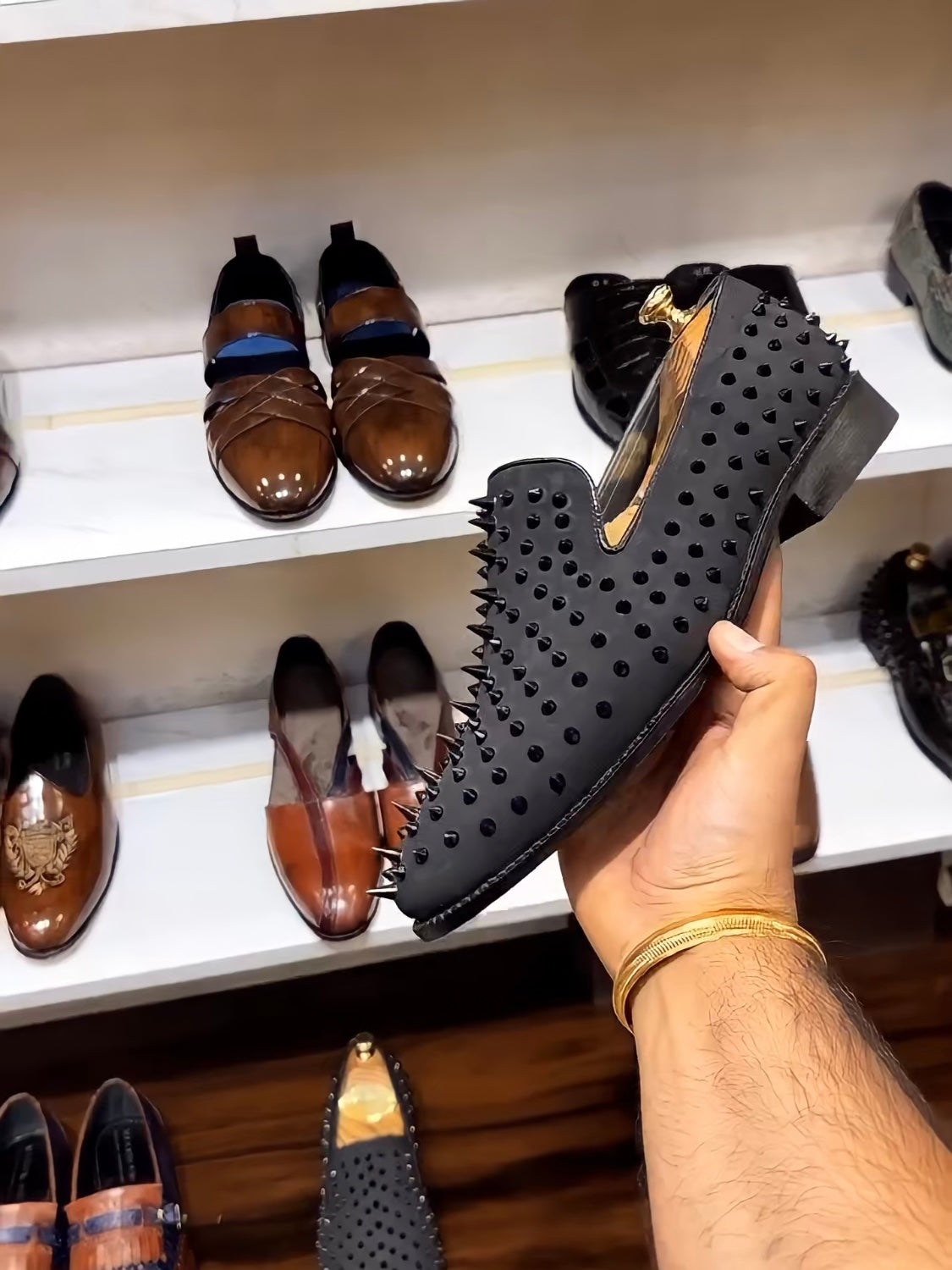 Black Studded Slip-ons with Red Bottoms