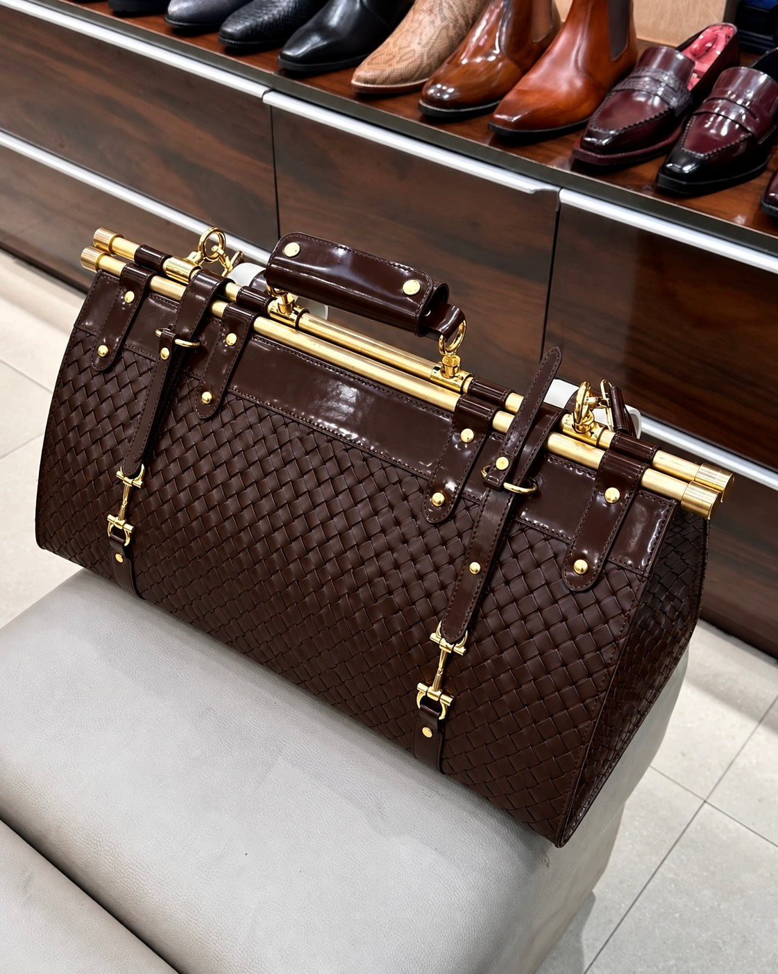 Dark Brown Hand-woven Leather Duffle Bag with Gold Pipe