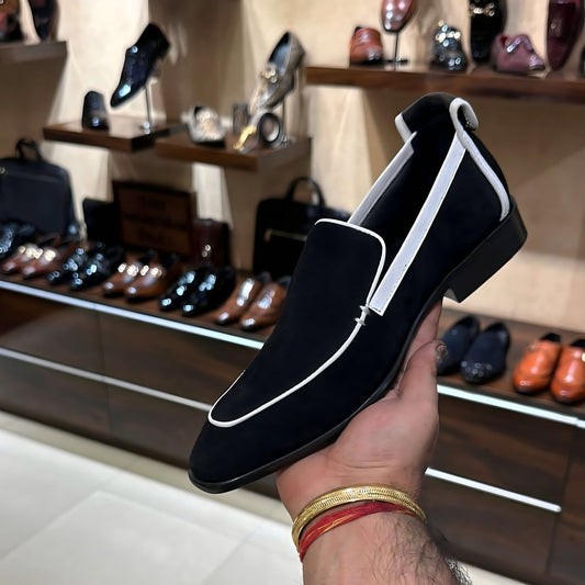 Black and White Suede Moccasins