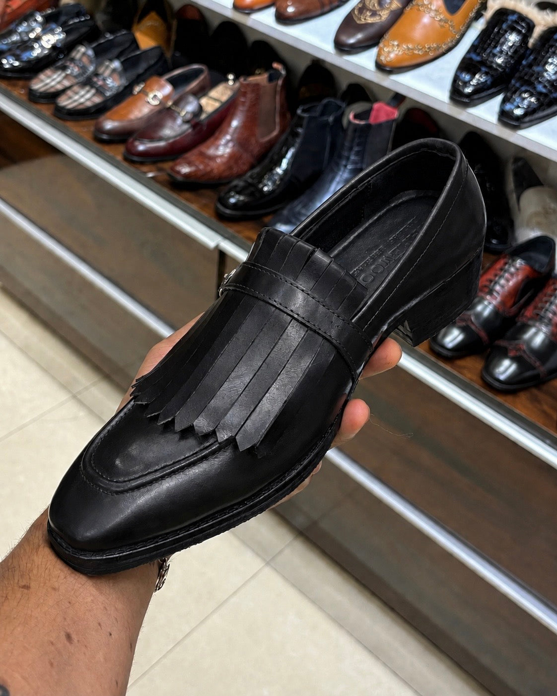 Black Fringe Loafers With Silver Buckle
