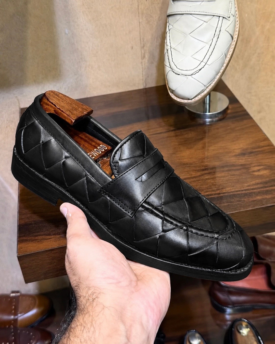 black woven penny loafers