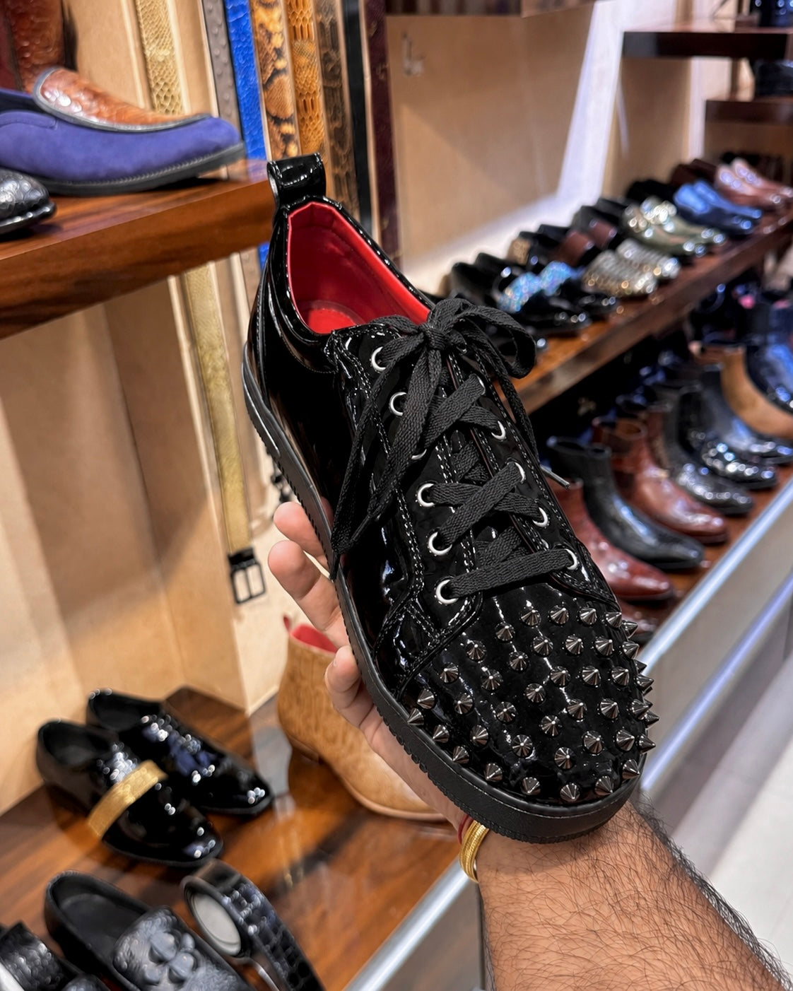 Black Patent Leather Studded Toe Sneakers With Red Interior