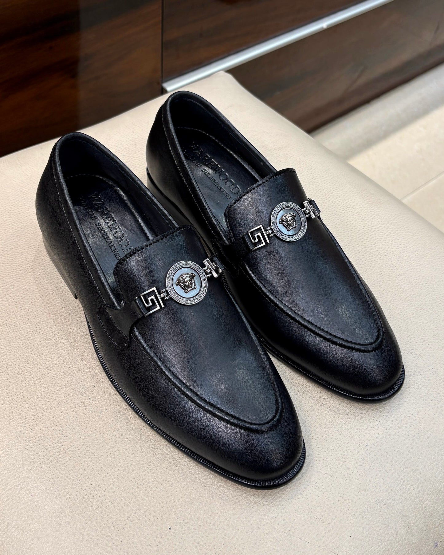 Black Calfskin Loafers with Silver Designer Horsebit