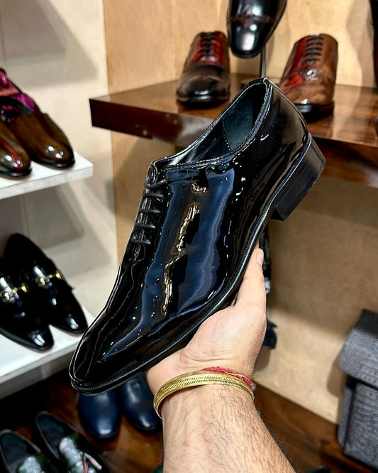 Classic Black Patent Leather Wholecut Oxfords