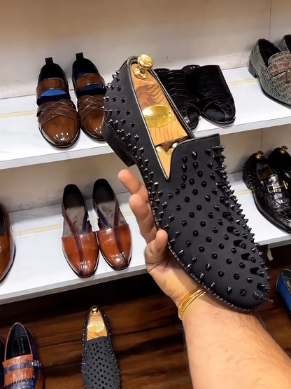 Black Studded Slip-ons with Red Bottoms