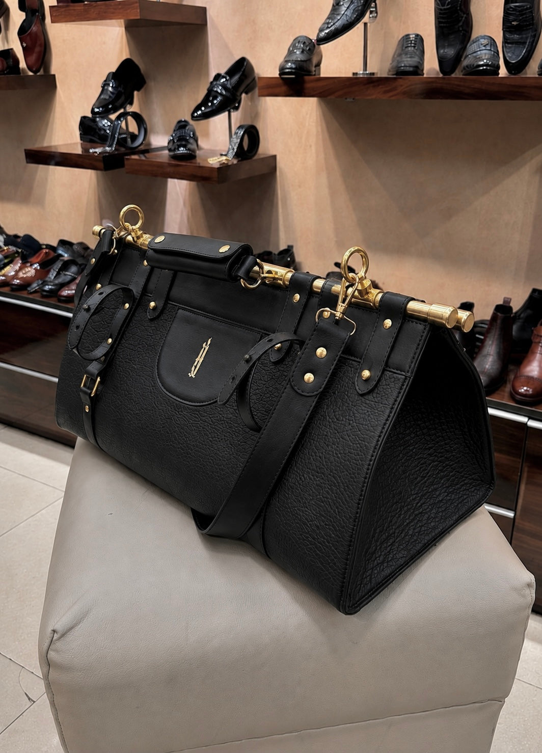 All Black Italian Leather Duffle Bag with Gold Pipe