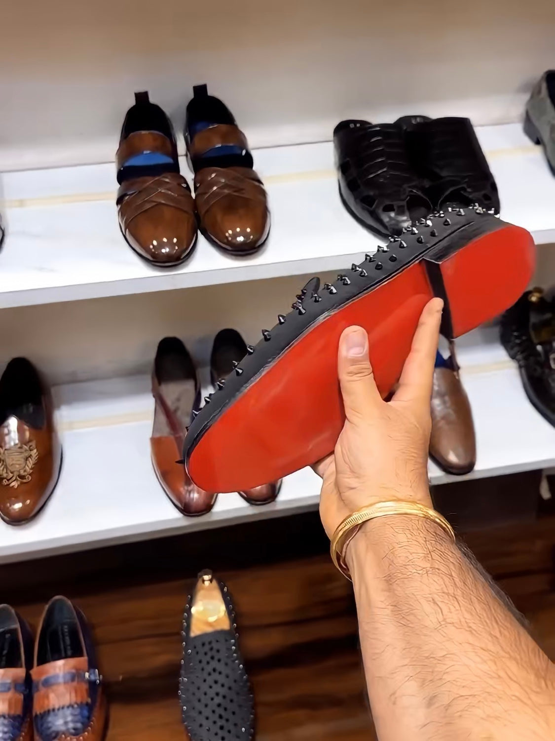 Black Studded Slip-ons with Red Bottoms