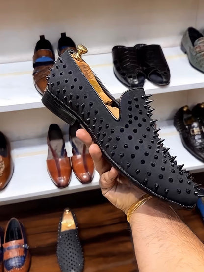 Black Studded Slip-ons with Red Bottoms