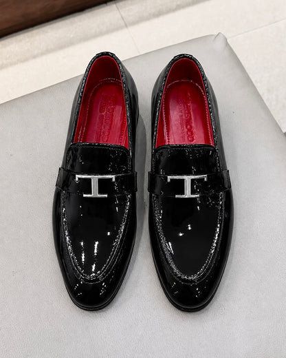 Black Patent Leather Loafers With Silver T Buckle And Red Interior