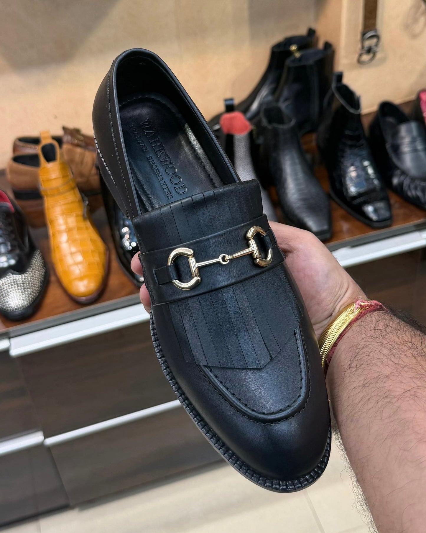 Black Fringe Horsebit Loafers with Red Bottom Sole