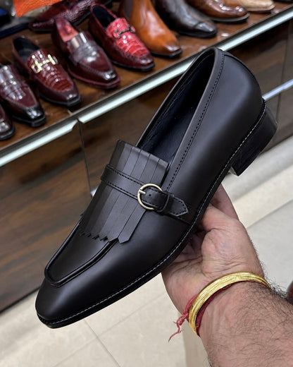 Black Fringe Loafers With Gold Buckle