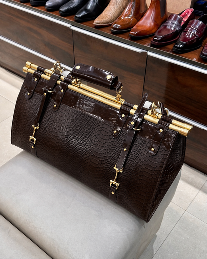 Dark Brown Cobra Scaled Duffle Bag with Gold Pipe