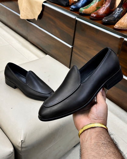 Black belgian loafers