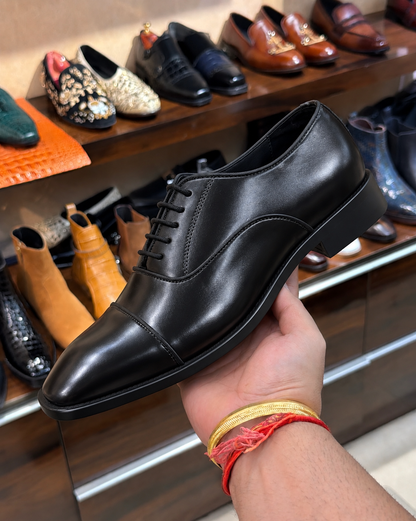 Black cap toe oxford shoes