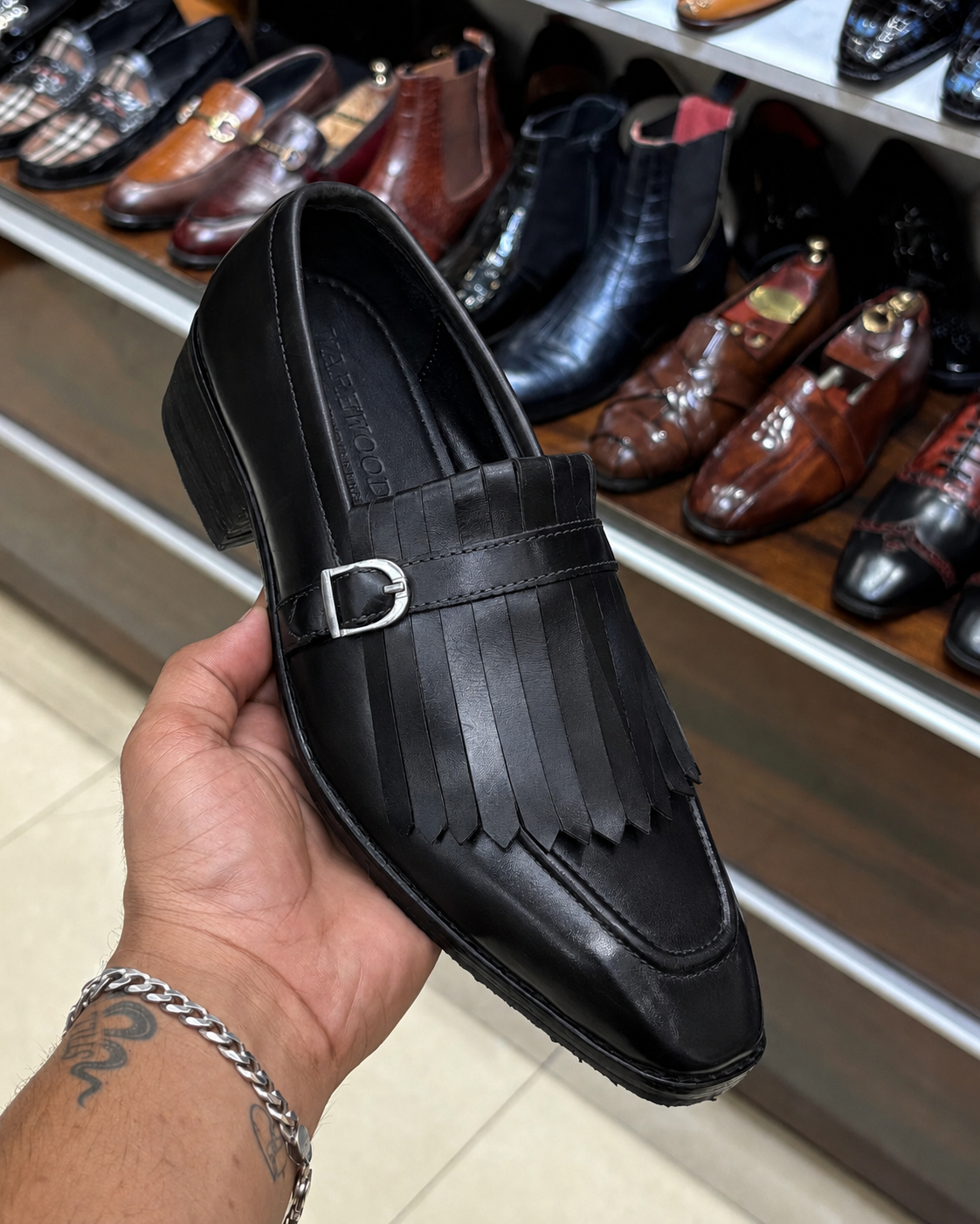 Black fringe shoes