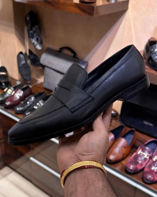 Black full grain leather penny loafers