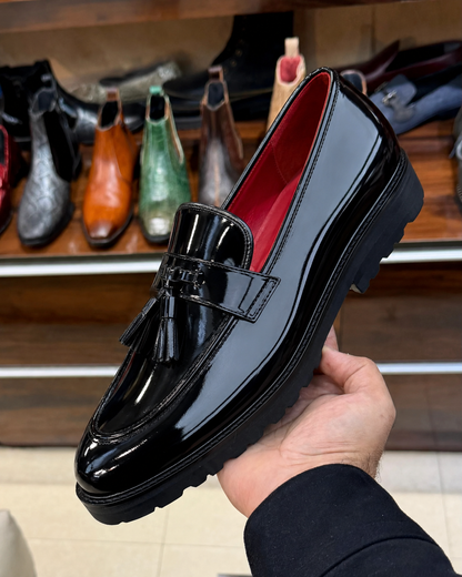 Black patent chunky tassel loafers