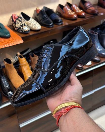 Black patent leather cap toe oxfords
