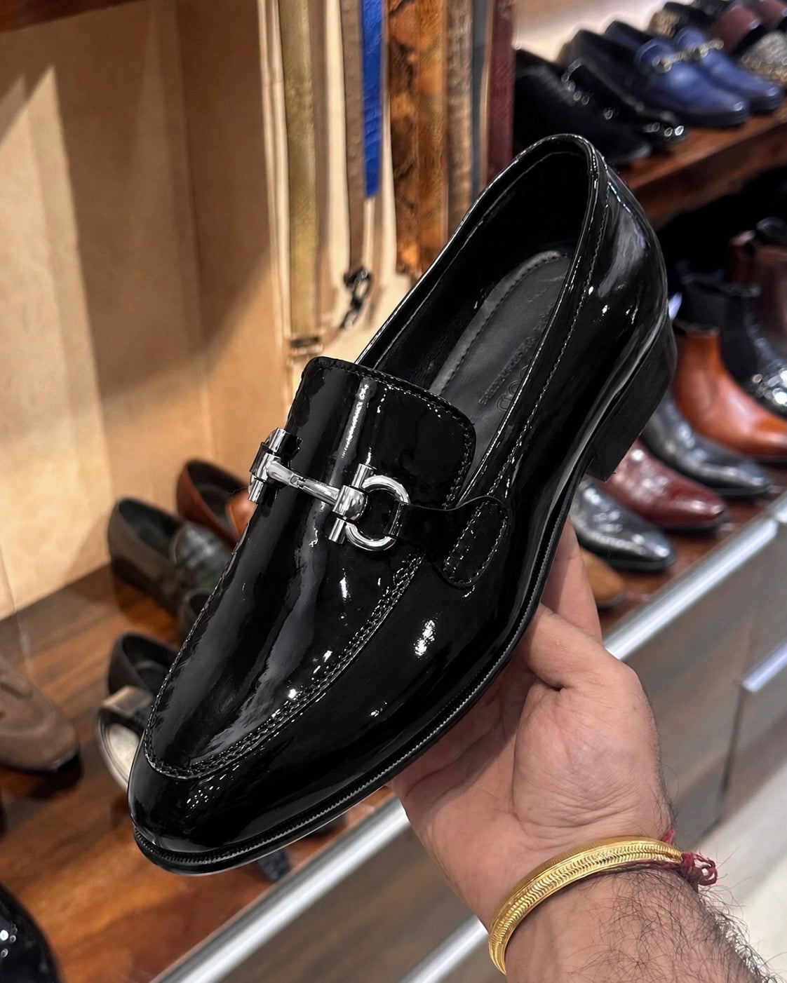 Black patent leather horsebit loafers