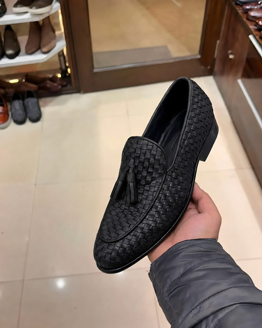 Black woven leather loafers