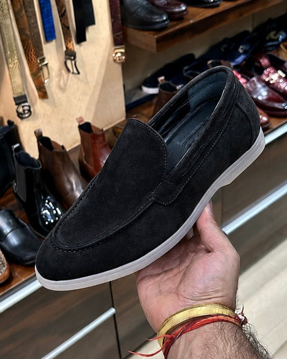 Black yacht loafers with white sole