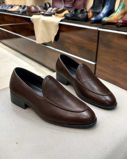 Brown belgian loafers