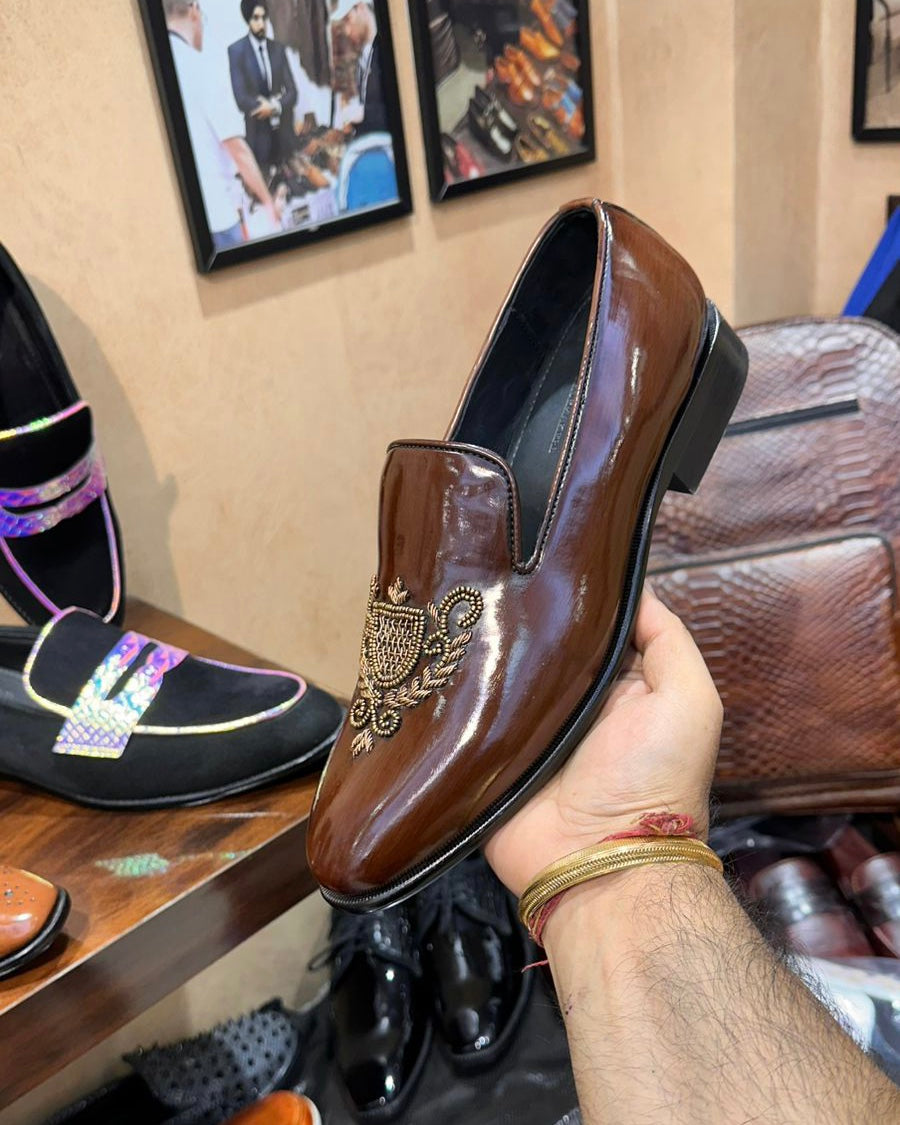 Brown embroidered loafers