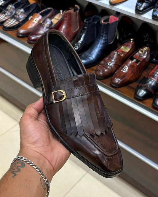 Brown fringe shoes