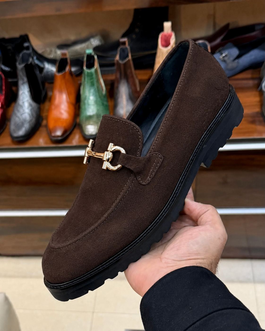 Brown suede lug sole loafers