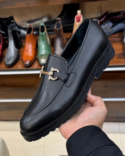 Black chunky horsebit loafers