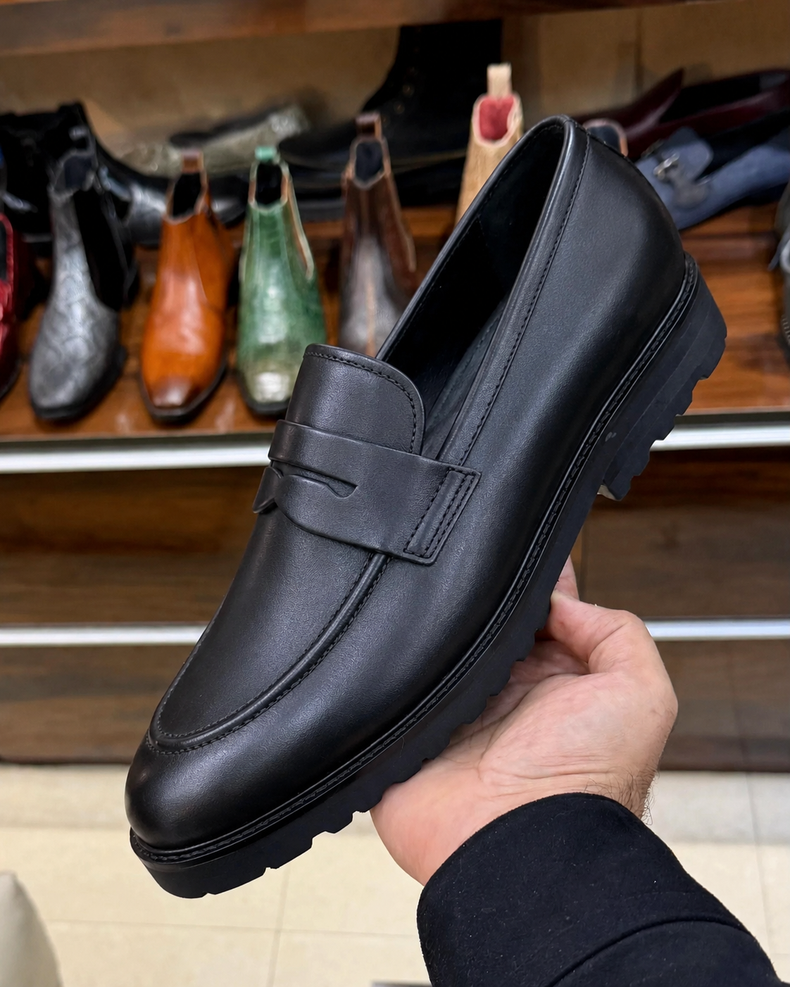 Black chunky penny loafers