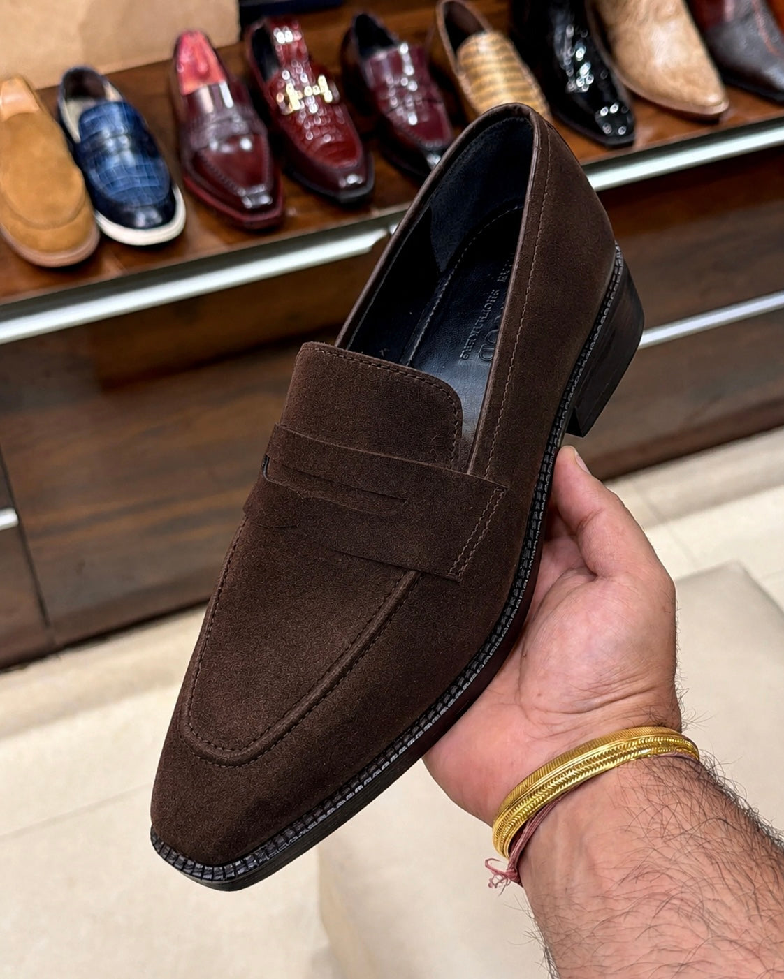 dark brown suede penny loafers