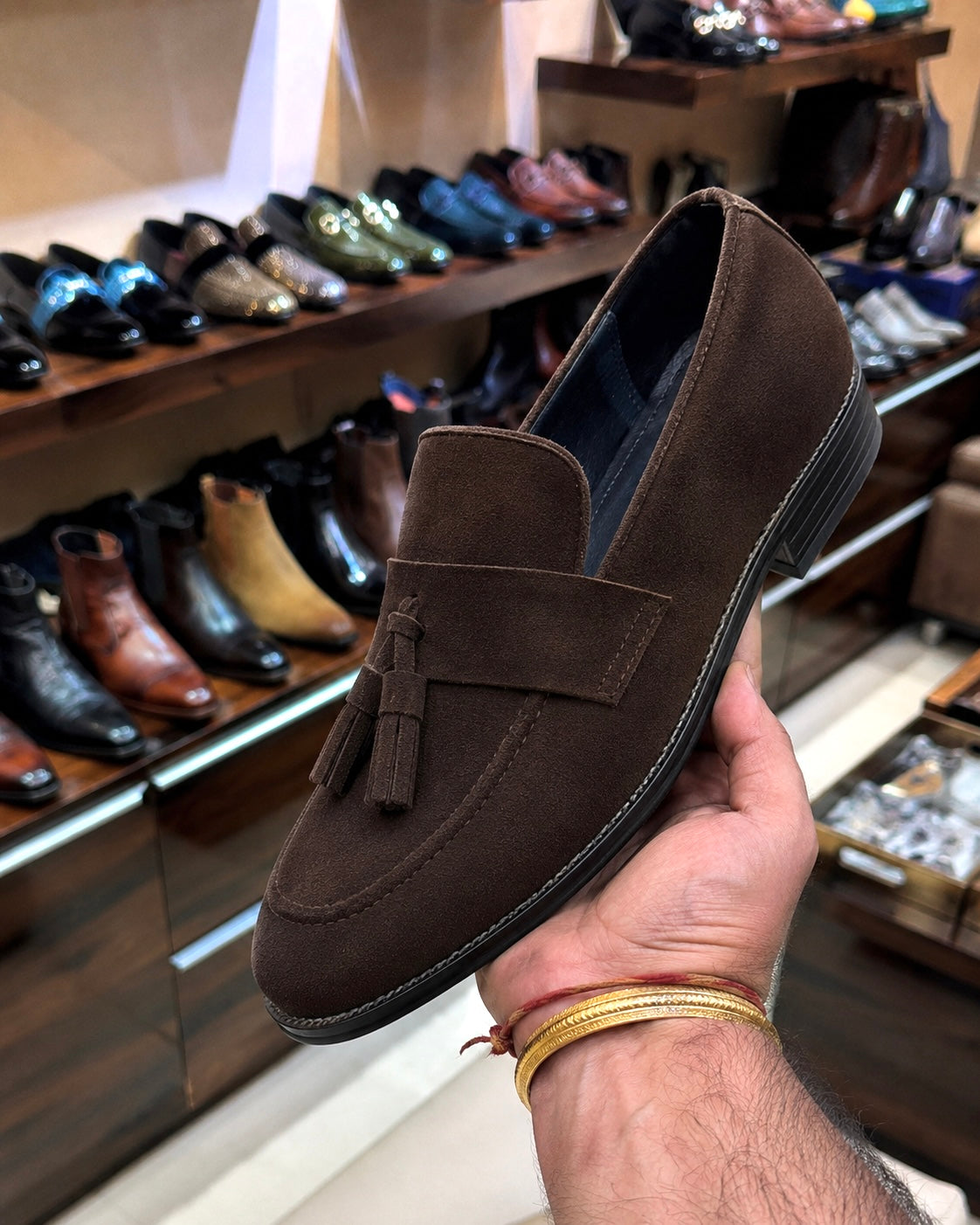 Dark brown suede tassel loafers