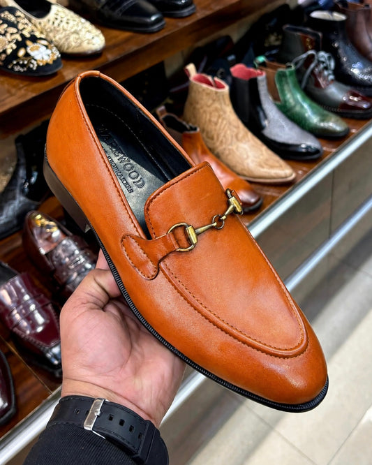 Tan horsebit loafers