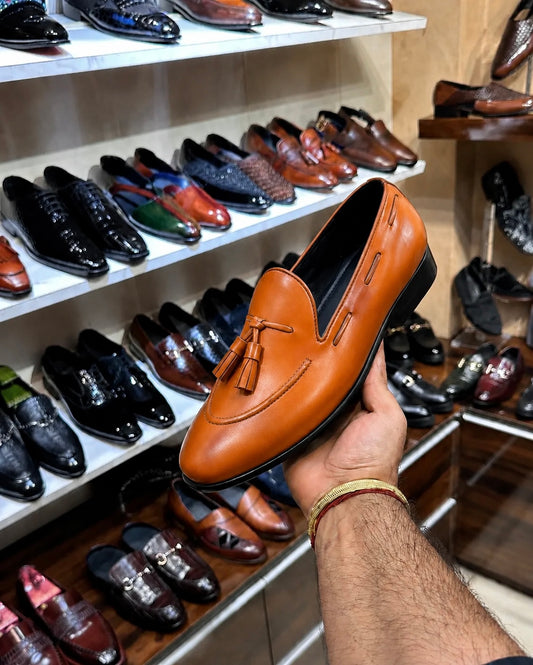 Tan loafers with tassels