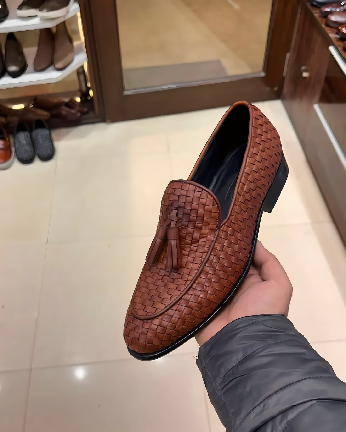 Tan woven leather loafers