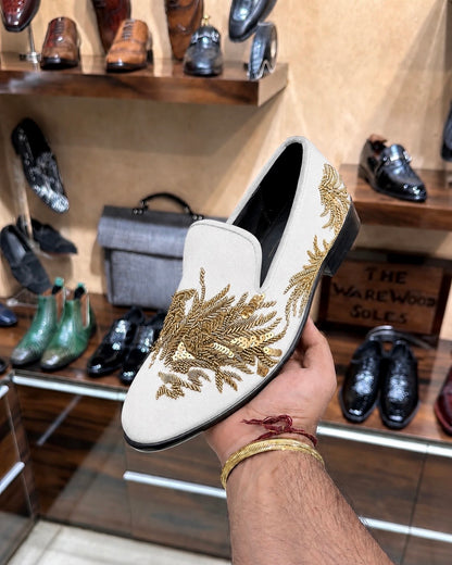 White loafers with gold embroidery 