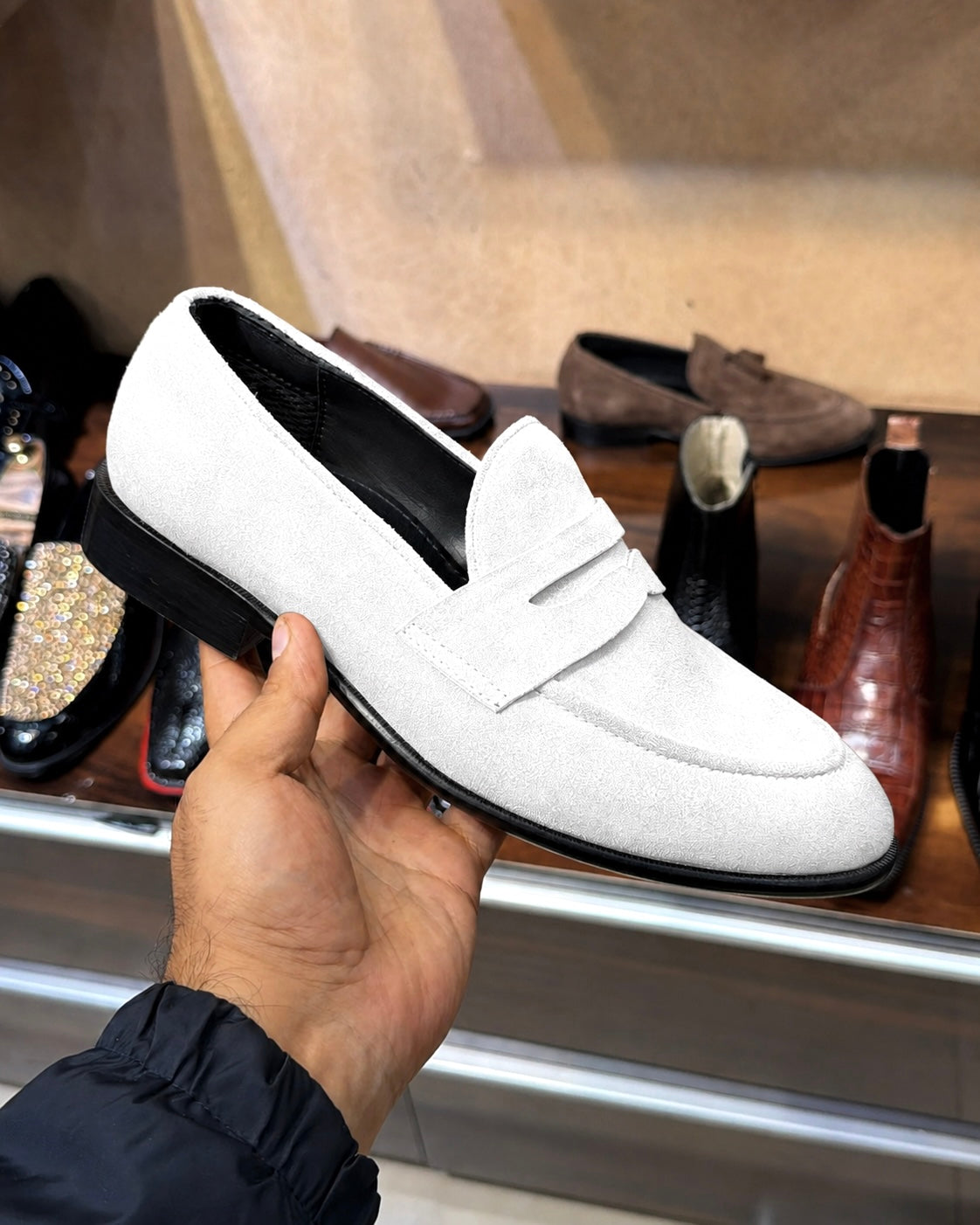White suede loafers